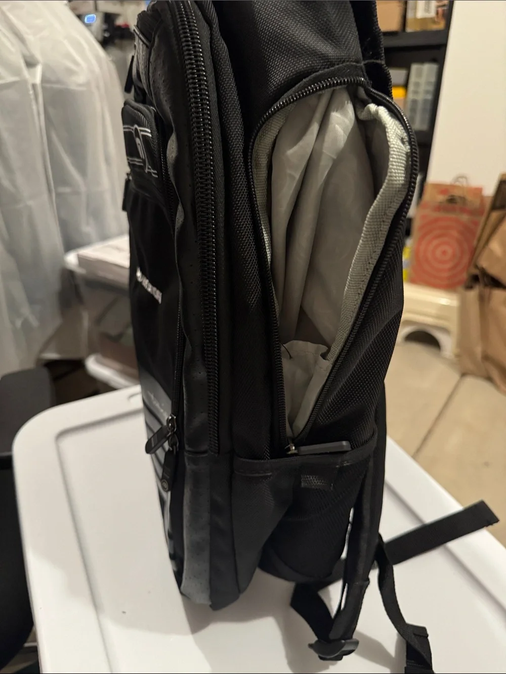 Travis Mathew Black Backpack with Silver Stripes